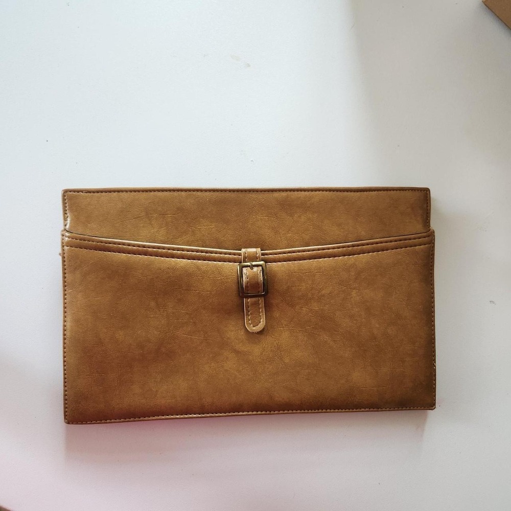 Vintage Gail Gibson camel/tan clutch handbag with a classic structured design